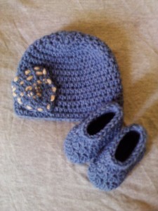 Crochet baby (0-3 mos) charity beanie and booties set. Denim colored yarn, Lion Brand Pound of Love